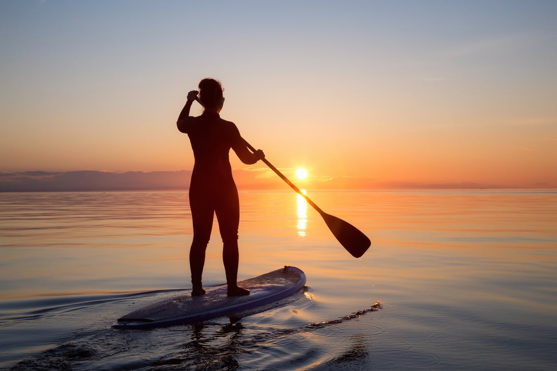 Paddle Boarding during Sunset